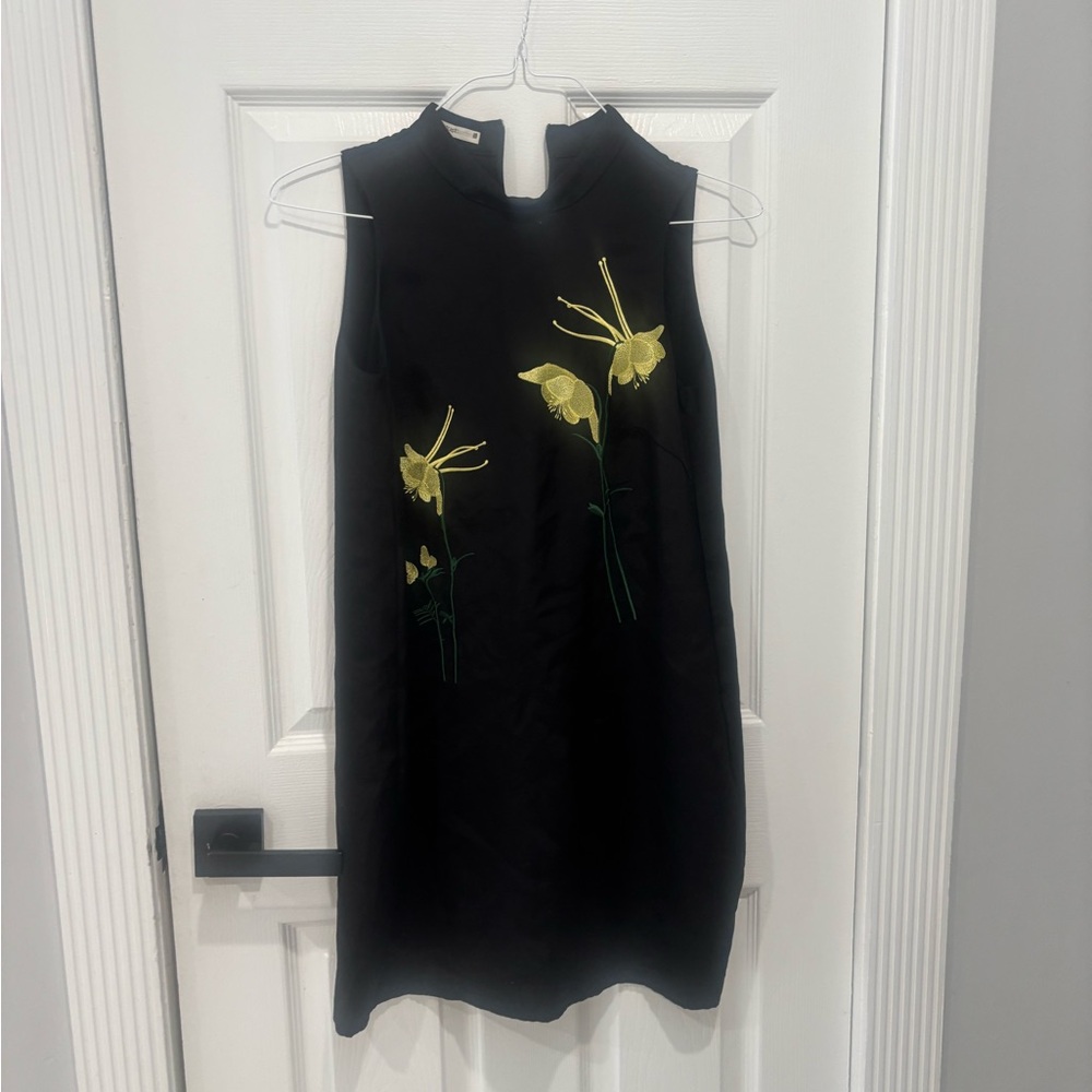 Chic Black Mini Dress with Yellow Floral Accents